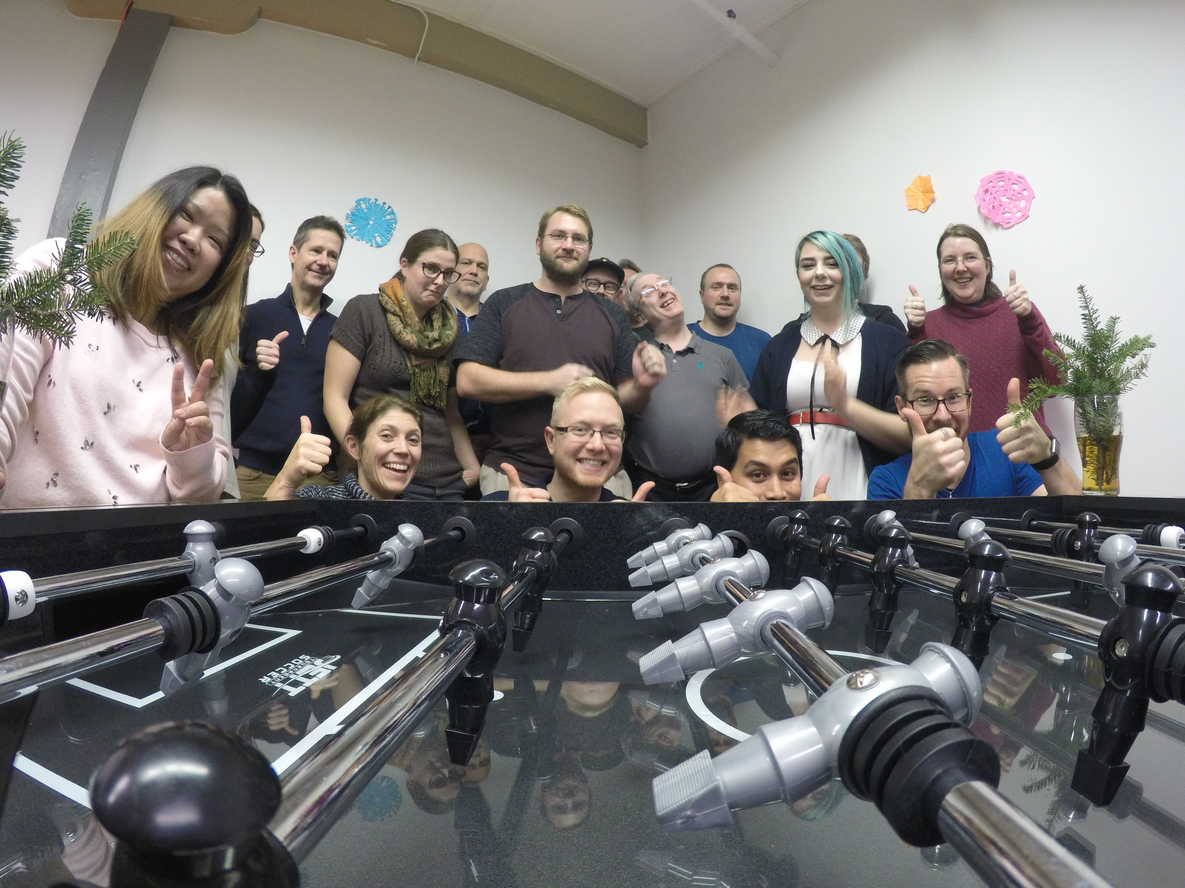 Emerge Team Photo with New Foosball Table